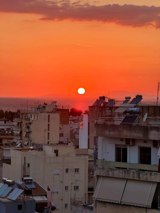 Vivid orange sunset over the sea from the terrace